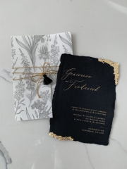 Invitation with handmade paper and gold leaf